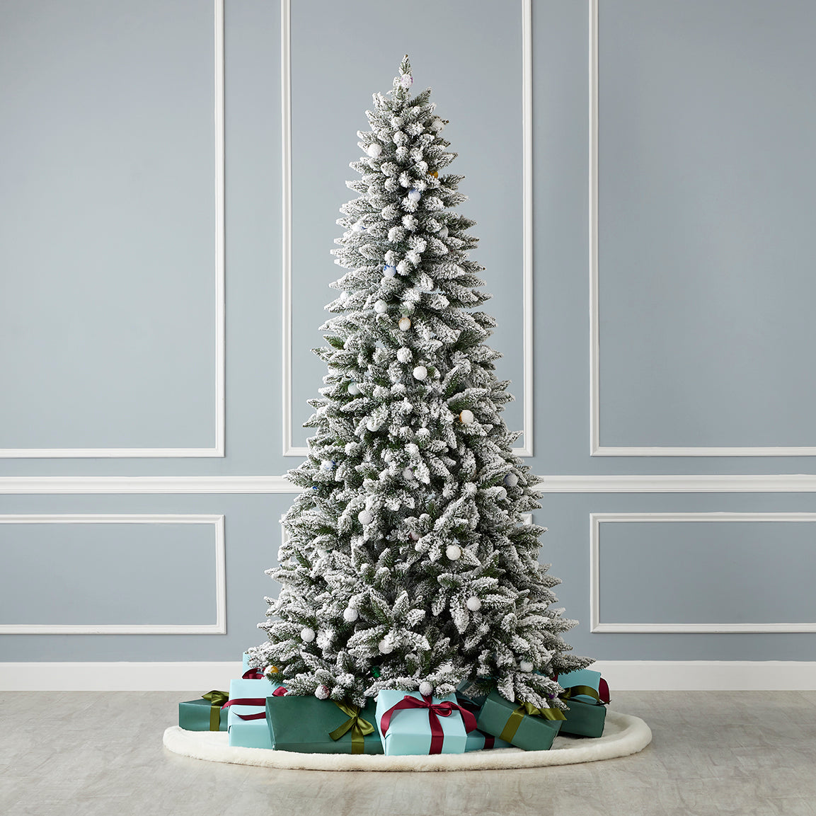 Snow Kissed Pine Flocked Pre-lit Tree with Multicolor LED Lights