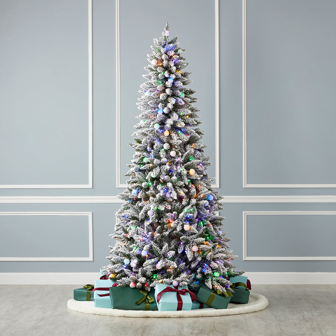 Snow Kissed Pine Flocked Pre-lit Tree with Multicolor LED Lights